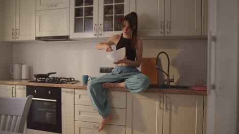 woman preparing food in her kitchen