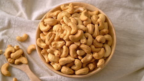 cashew nuts in wooden bowl