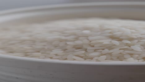 uncooked white rice in a bowl