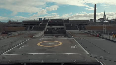 abandoned city hall with helipad - aerial view