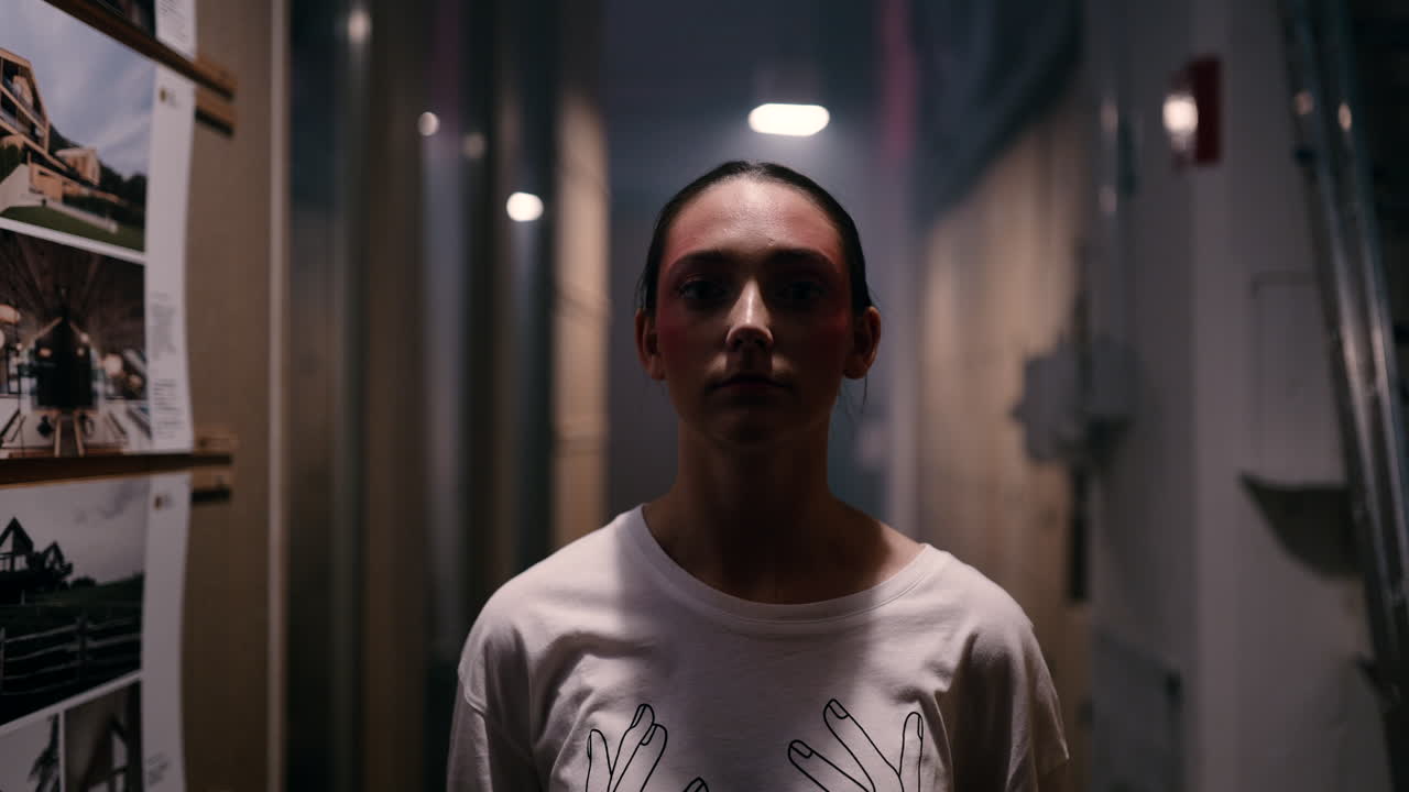 Teenage girl in a hallway