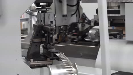 automated robotic assembly machine in a factory setting