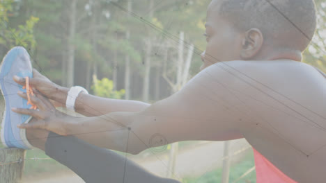 animation of network of connections over woman stretching exercising in forest