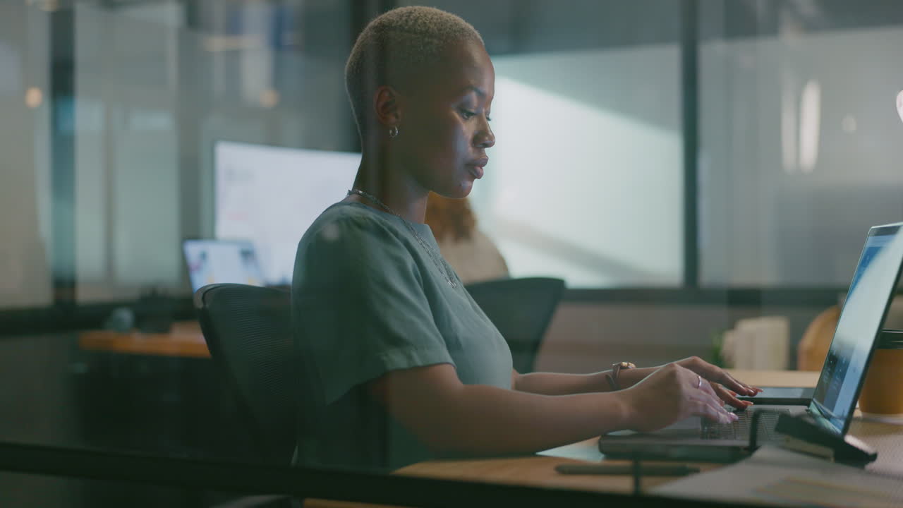 Business, office laptop or black woman typing