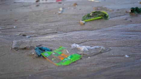 mahim dirty beach polluted sea water waste garbage closeup view in mumbai