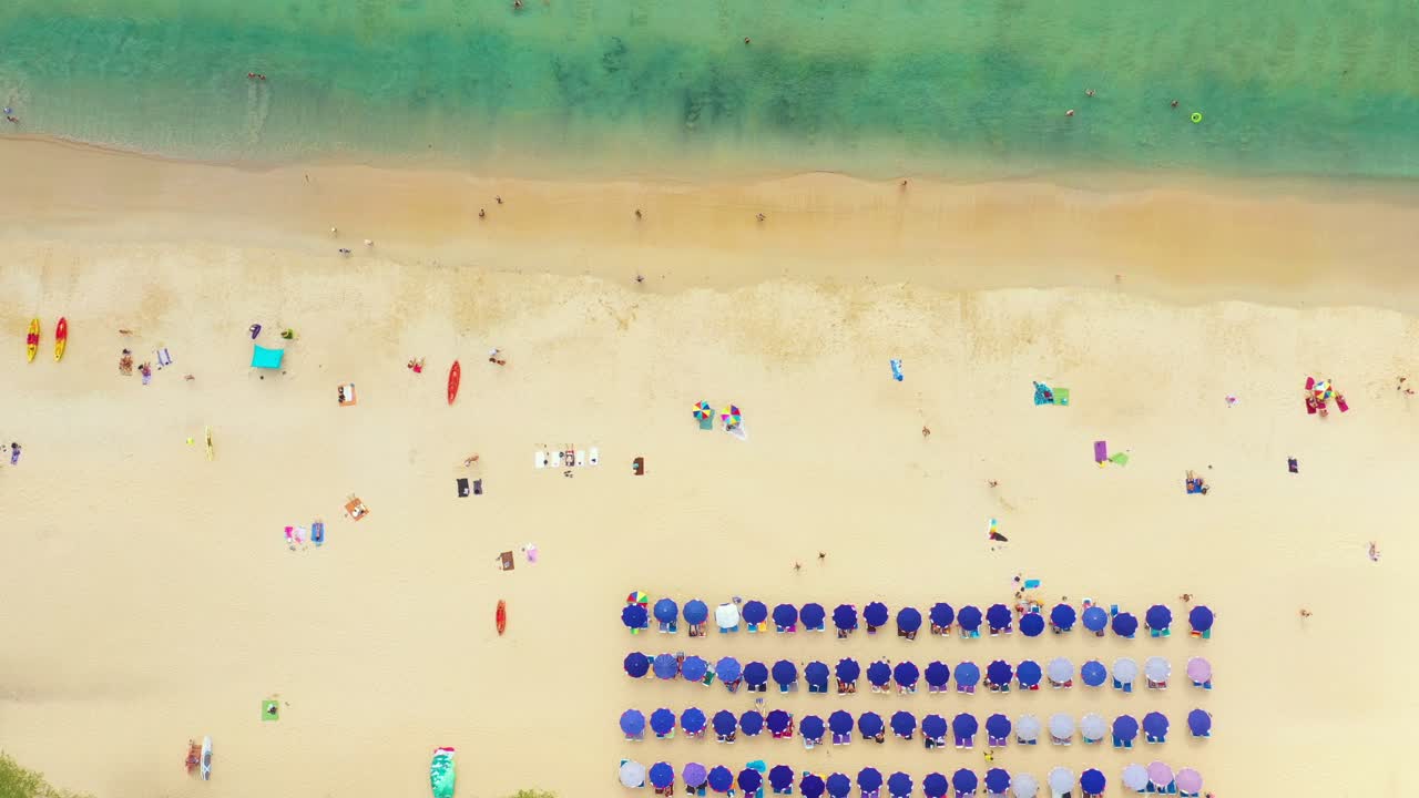 Aerial flying drone view of Kot Noi Beach white sandy beach on sunny tropical paradise island with aqua blue sky sea water ocean. Phuket