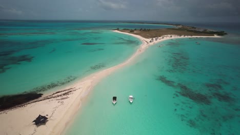 cayo de agua with white sandy beaches and turquoise waters in los roques, aerial view