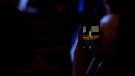 businesswoman recording lecture during business seminar in auditorium 4k