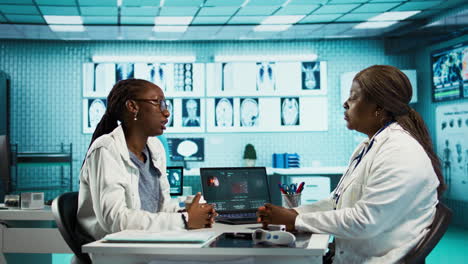 african american patient interacting with a physician in a medical office,