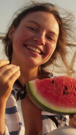 woman enjoying a watermelon