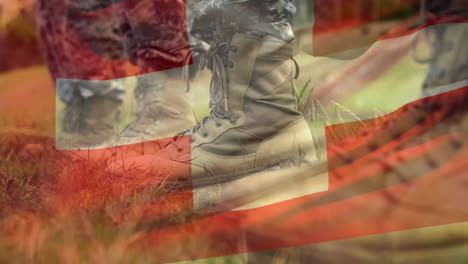 animation of flag of switzerland waving over soldiers boots