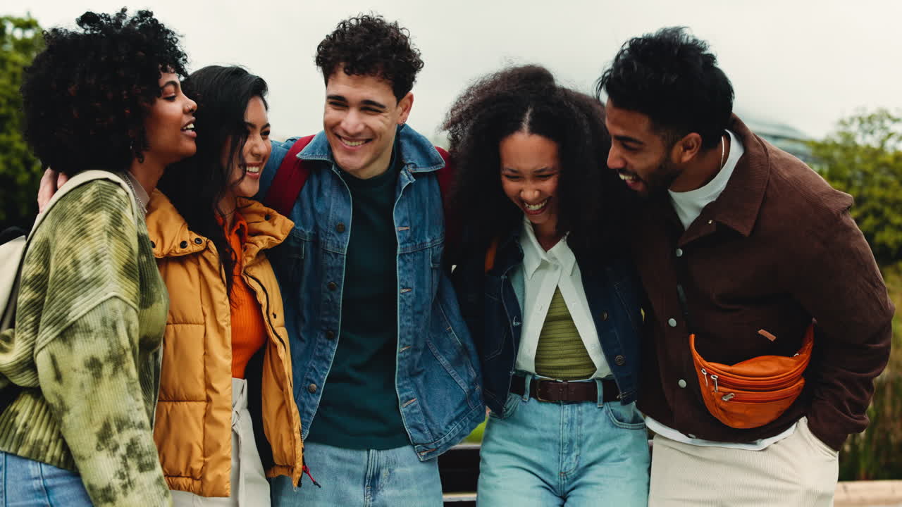 Happy Diverse Group of Friends Laughing and Talking Outdoors