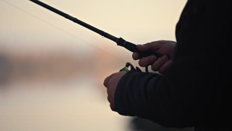 fisherman with fishing rod