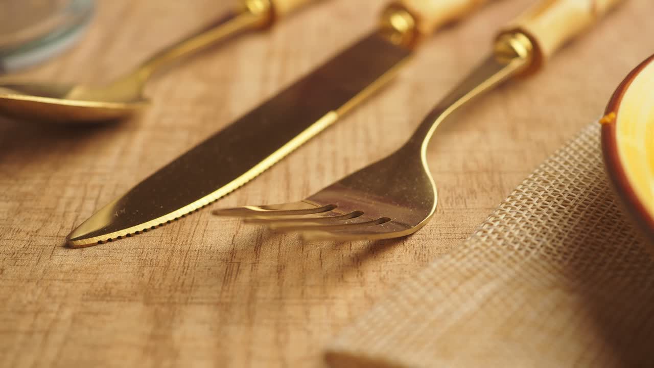 Close-up of a set table with cutlery