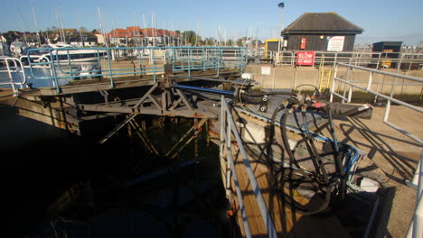 wide shot of the inside of the lock gates closed on the marina side at hythe marina