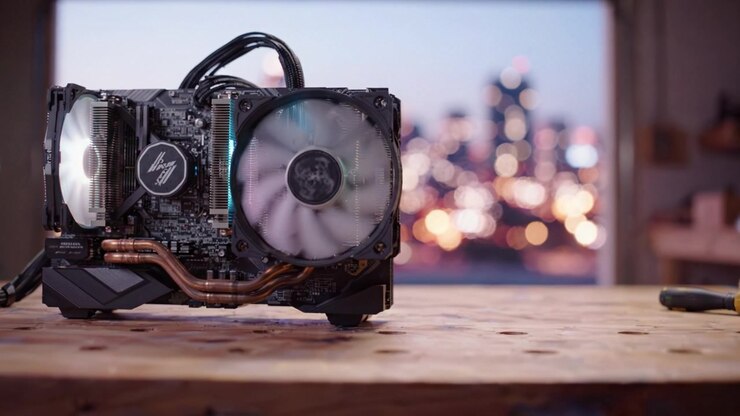 Exploring the Intricacies of a High-Performance PC Build as Enthusiasts Dive into the World of Gaming Technology and Custom Hardware on a Scenic Urban Night