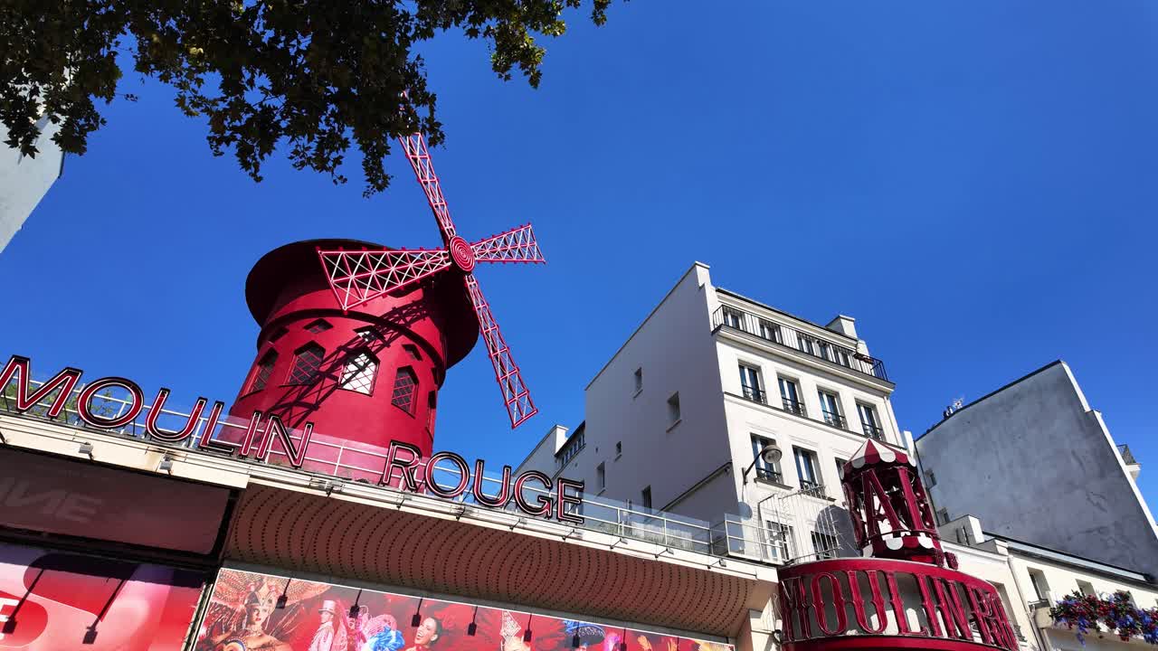 Moulin Rouge famous cabaret building Paris France red light district day time