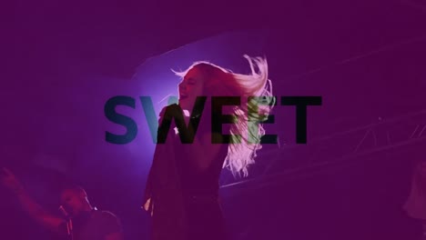 animation of sweet text over woman singing during concert on stage with purple tint