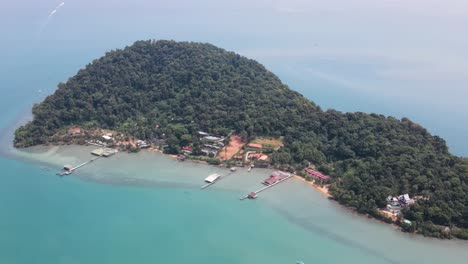 Aerial-High-Angle-view-of-sand-beach,-turquoise-sea-and-resorts-on-Koh-Chang,-Thailand