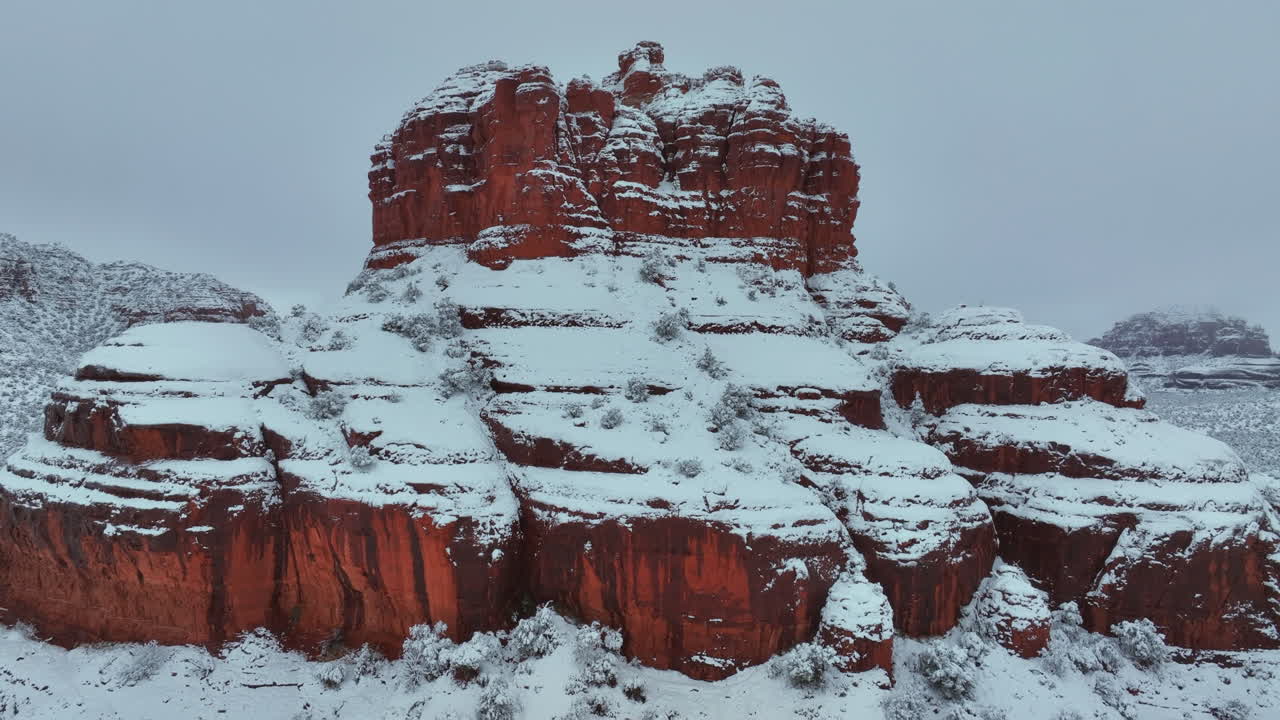 Red Rock Formation Covered With Snow In Sedona, Arizona In Winter - Aerial Drone Shot