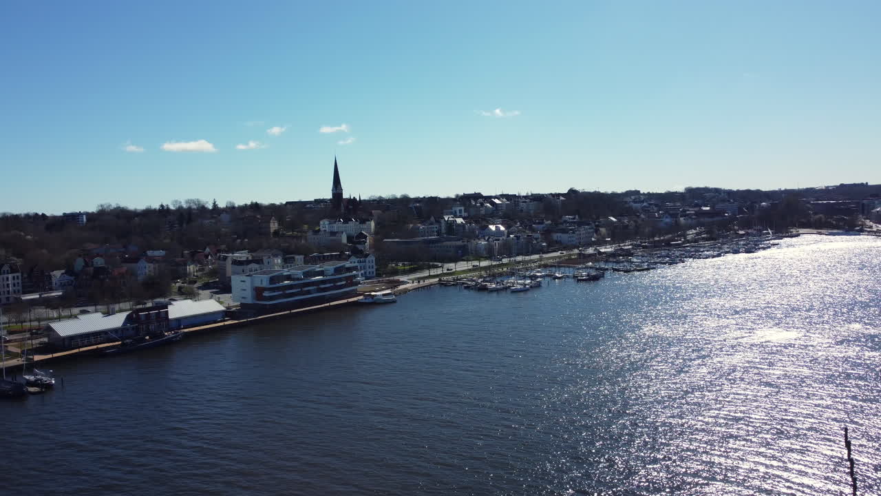 Aerial view of a European city with a marina