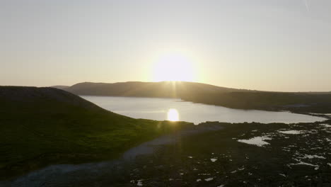 sunset over coastal hills