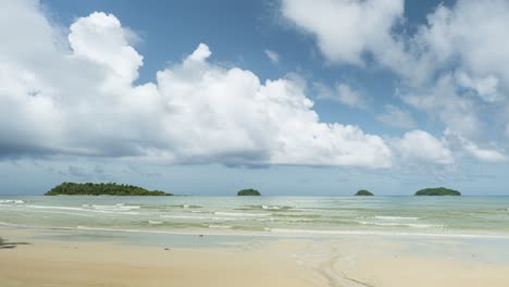 4k timelapse of moving cumulus clouds forming over islands and beach in koh chang, thailand