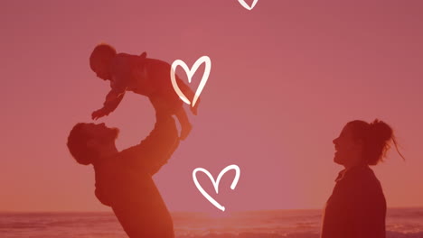 해변에서 아이와 함께 행복한 백인 부모에 대한 백인 심장의 애니메이션