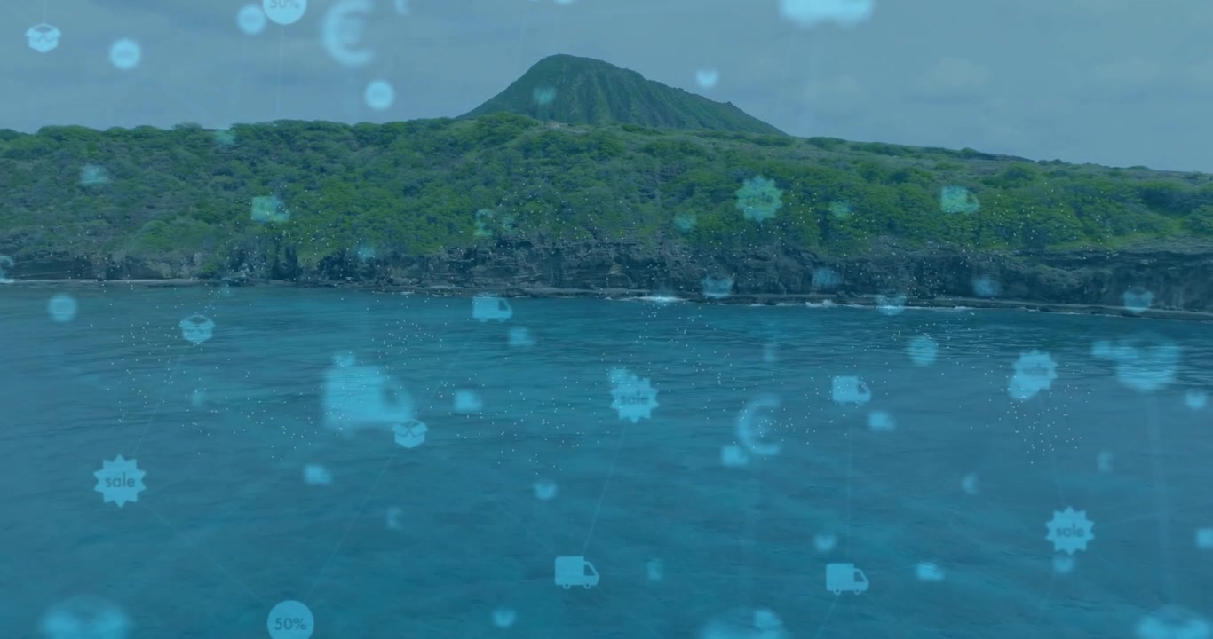 熱帯の火山島の上で、薄れていくターコイズ色のアイコンがアニメーションし、商業を表すように漂っている。