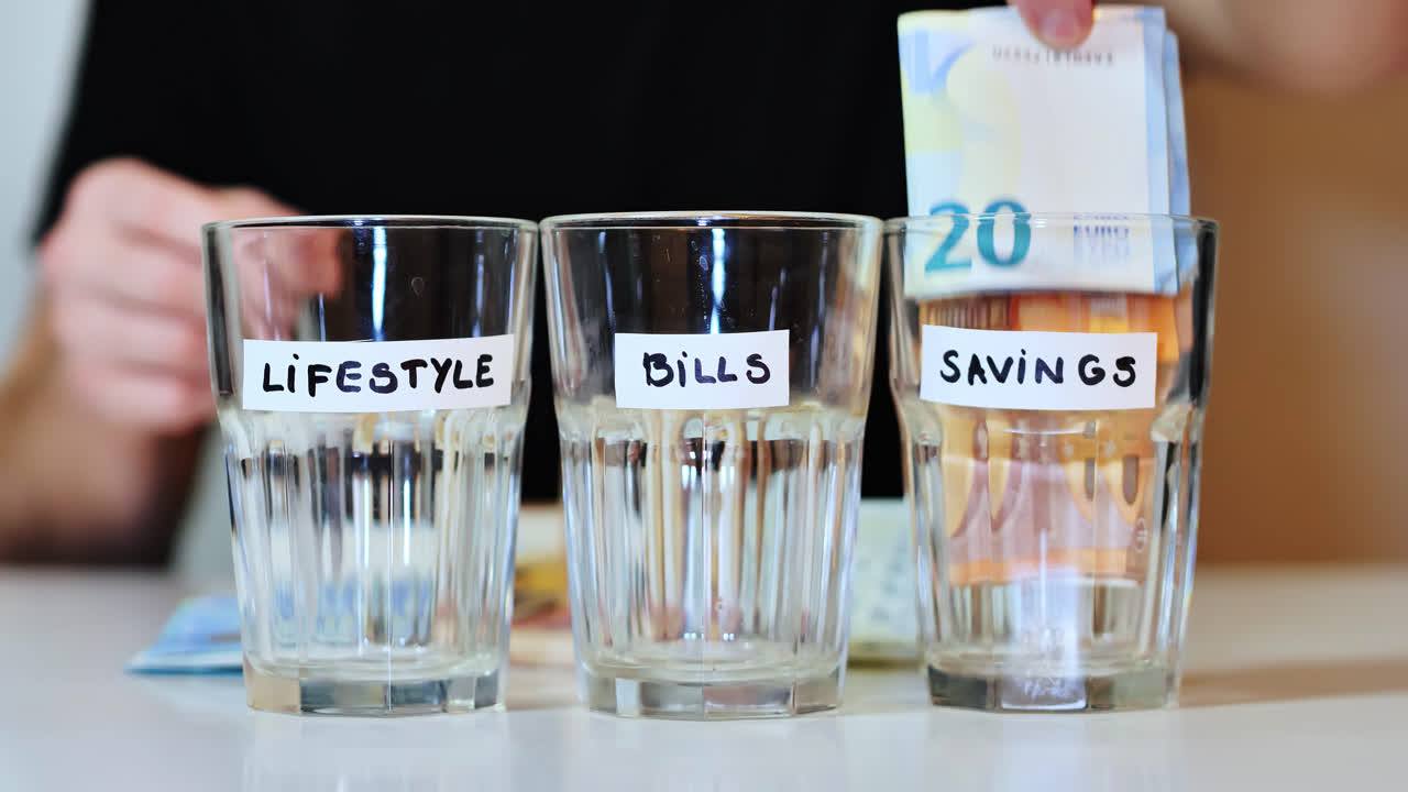 Personal finance jars left empty as man withdraws final savings note in economic stress