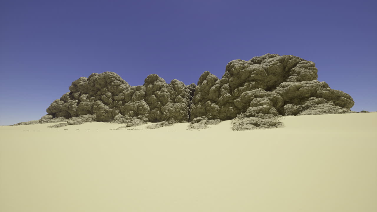 Unique rock formation rises above sandy landscape in remote desert area