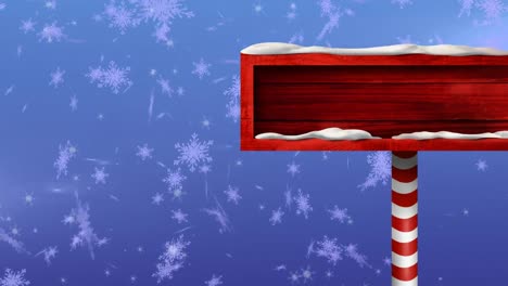 Animation-of-snow-falling-over-christmas-wooden-sign-board-with-copy-space