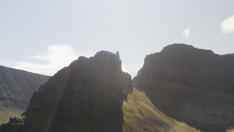 looking up at the peak of svalvogar mountain in iceland on a bluebird sunny day in summer on the european island