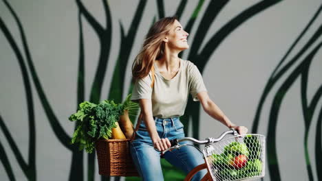 happy woman riding a bicycle in the city