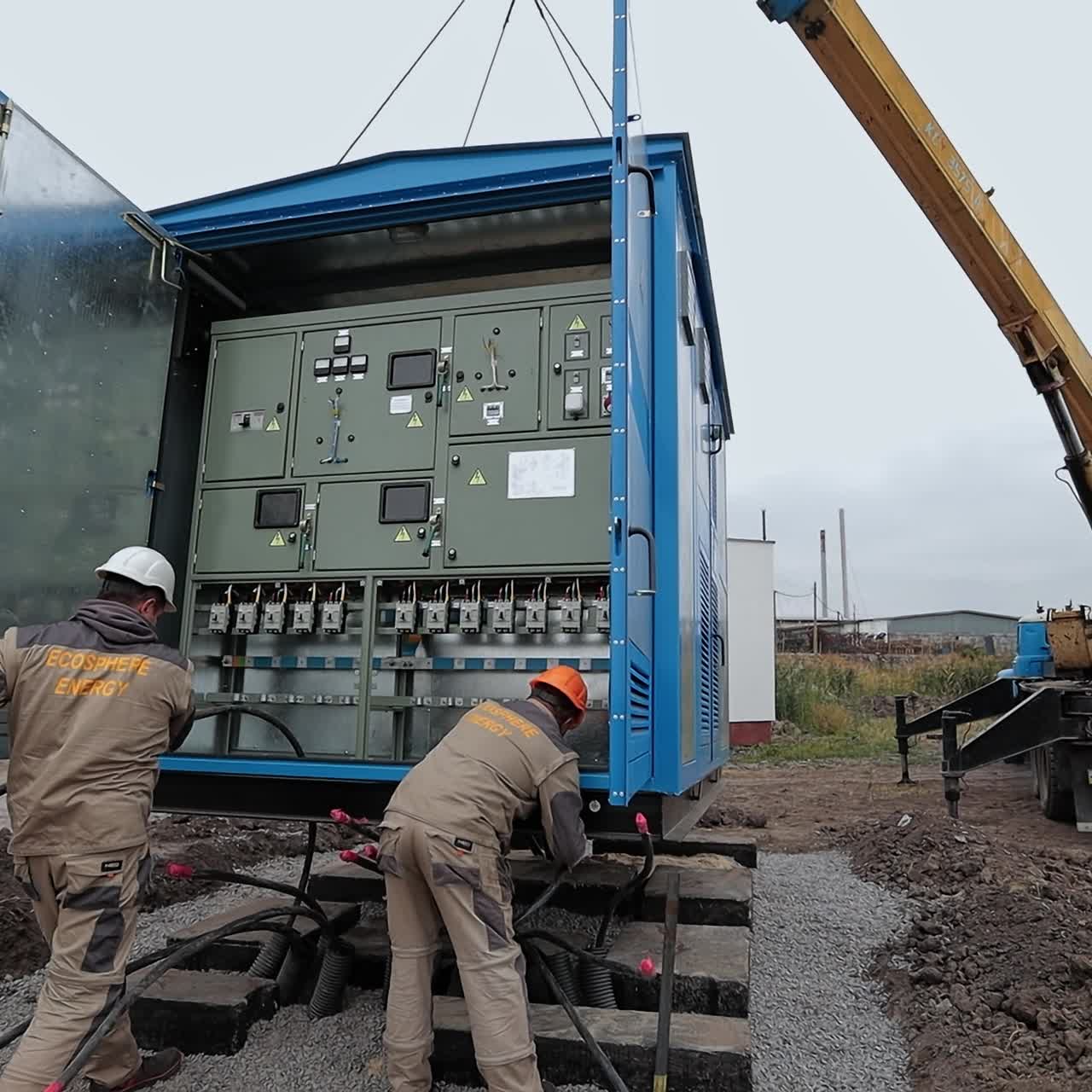 Specialists checking electic supply. Electric station engineer instalation