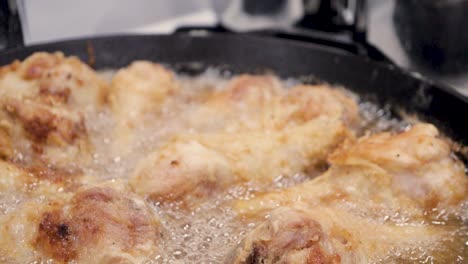 frying chicken drumsticks for dinner
