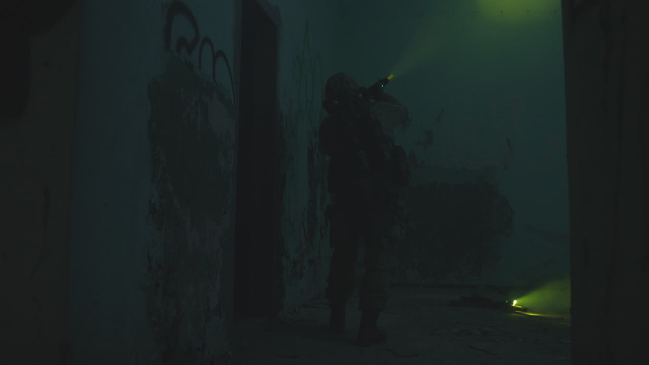 A wounded soldier in the abandoned military complex during the recon mission