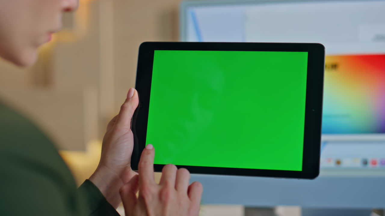 Unrecognizable worker tapping mockup tablet working at design studio close up.