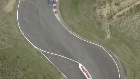 vintage racing cars driving on pau-arnos circuit, france