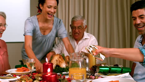 family having christmas dinner at home