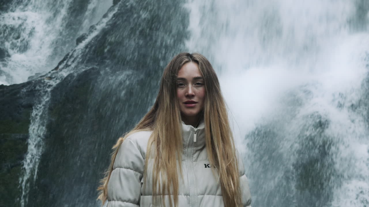 Woman at a Waterfall