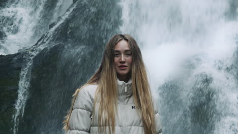 woman at a waterfall