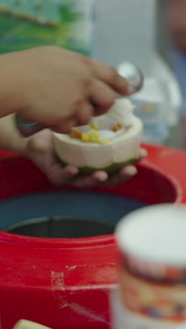 coconut ice cream being scooped