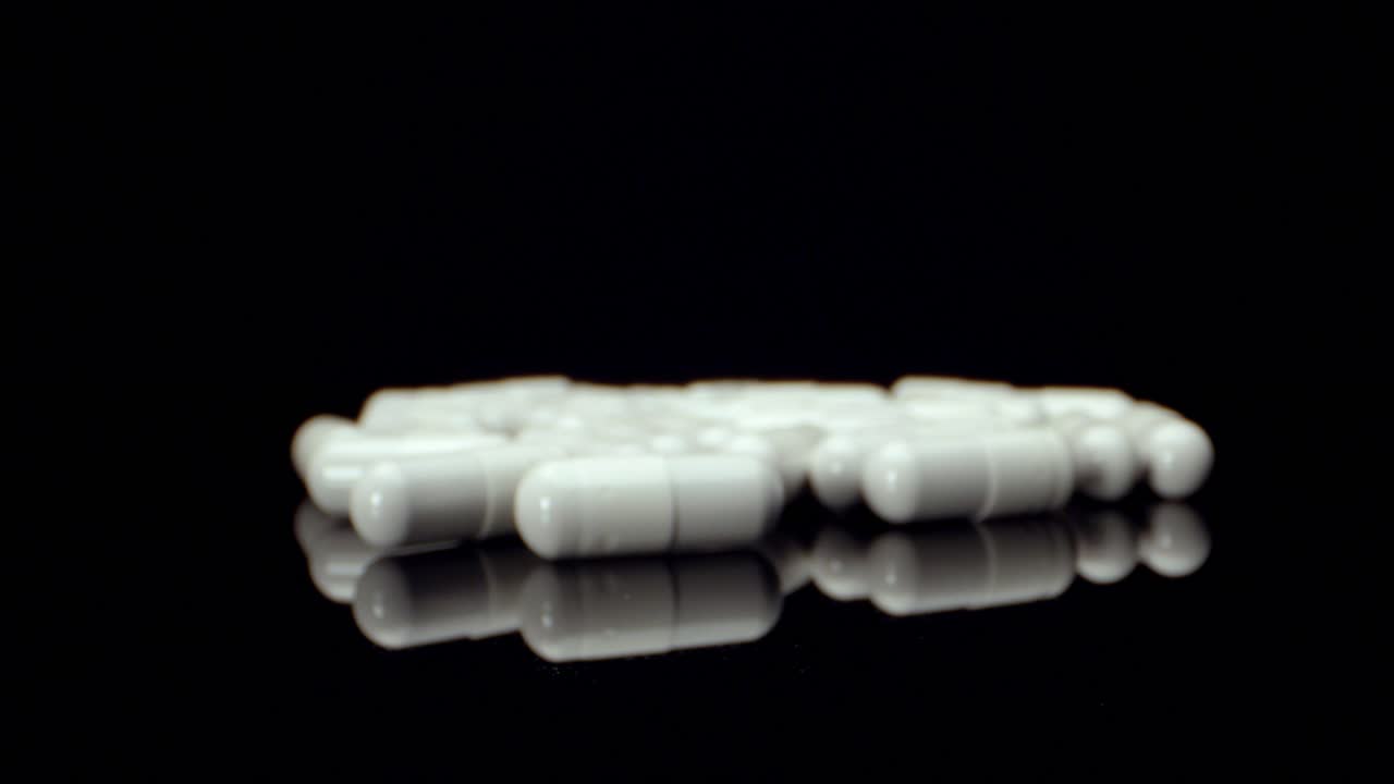 White healthy diet suplement Medicine pills  mega super macro view shoot HQ 4k