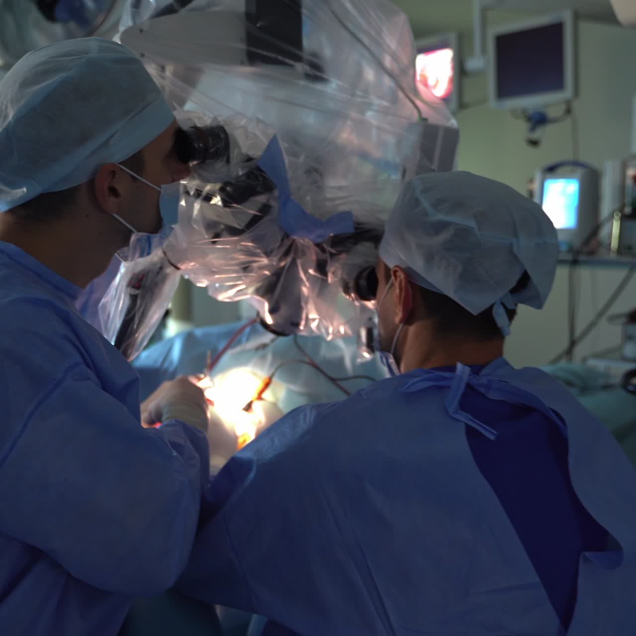 Professional neurosurgery specialists working in team. Emergency doctors in group perfoming operation