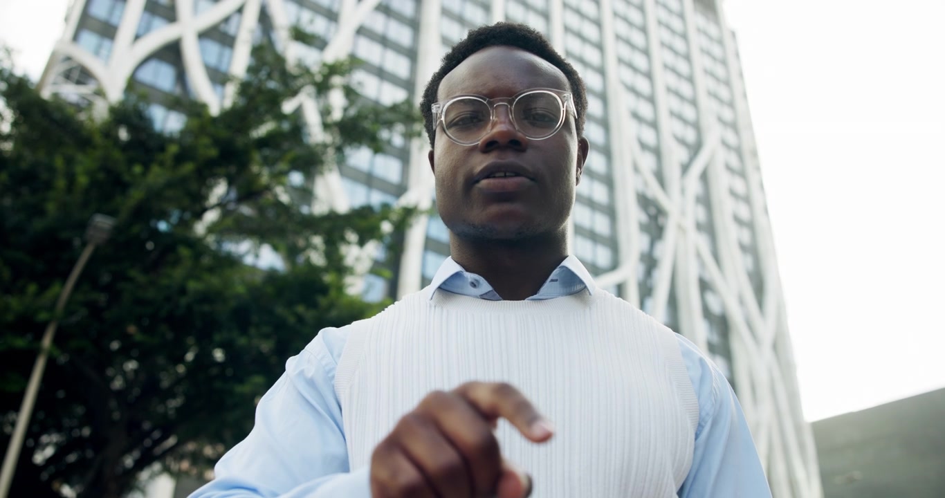 Young Professional Man Using Virtual Interface in Modern City