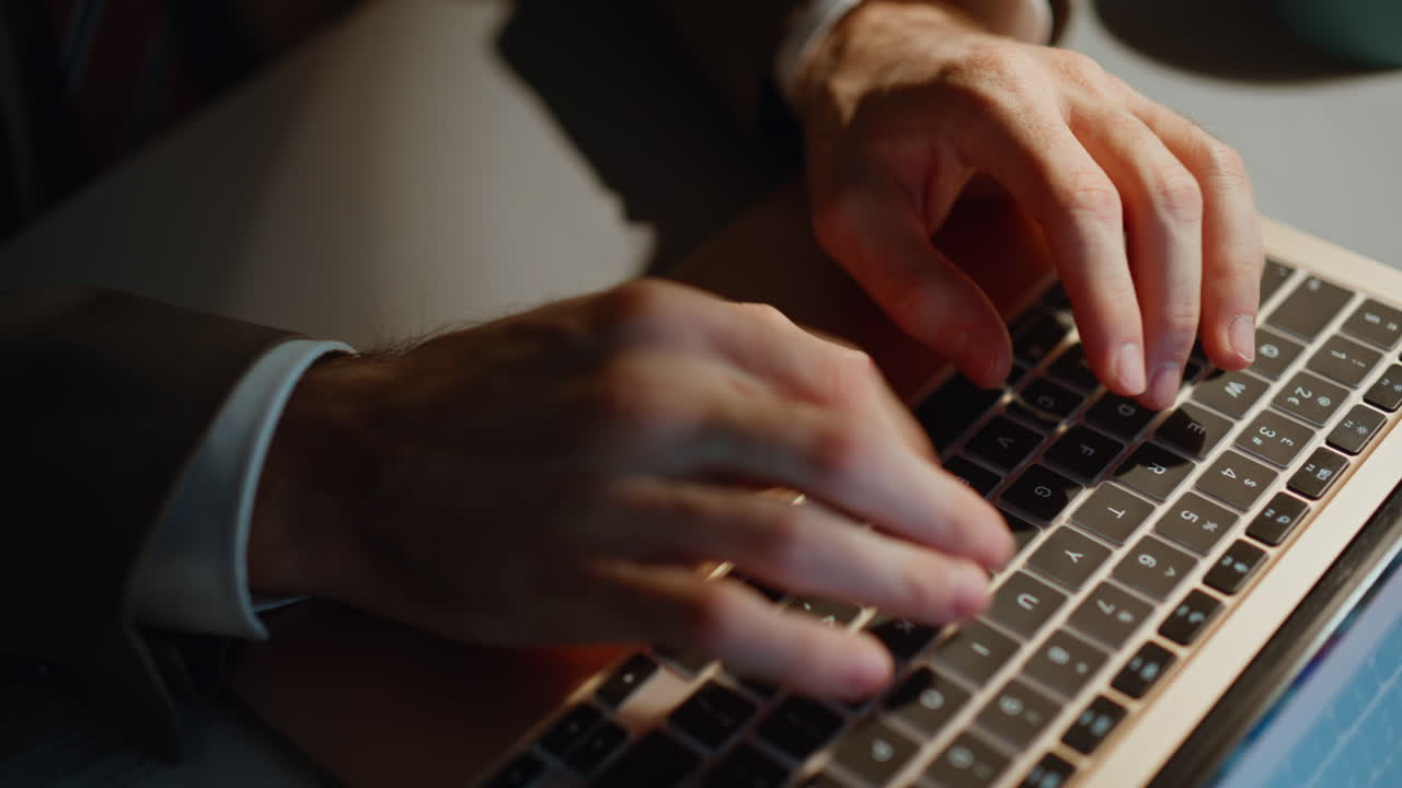 Hands texting night work on laptop at office high angle closeup. Boss working