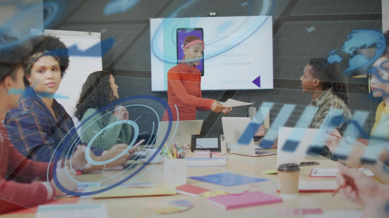Animation of loading circles, graphs, globe over diverse coworkers discussing about cellphone design