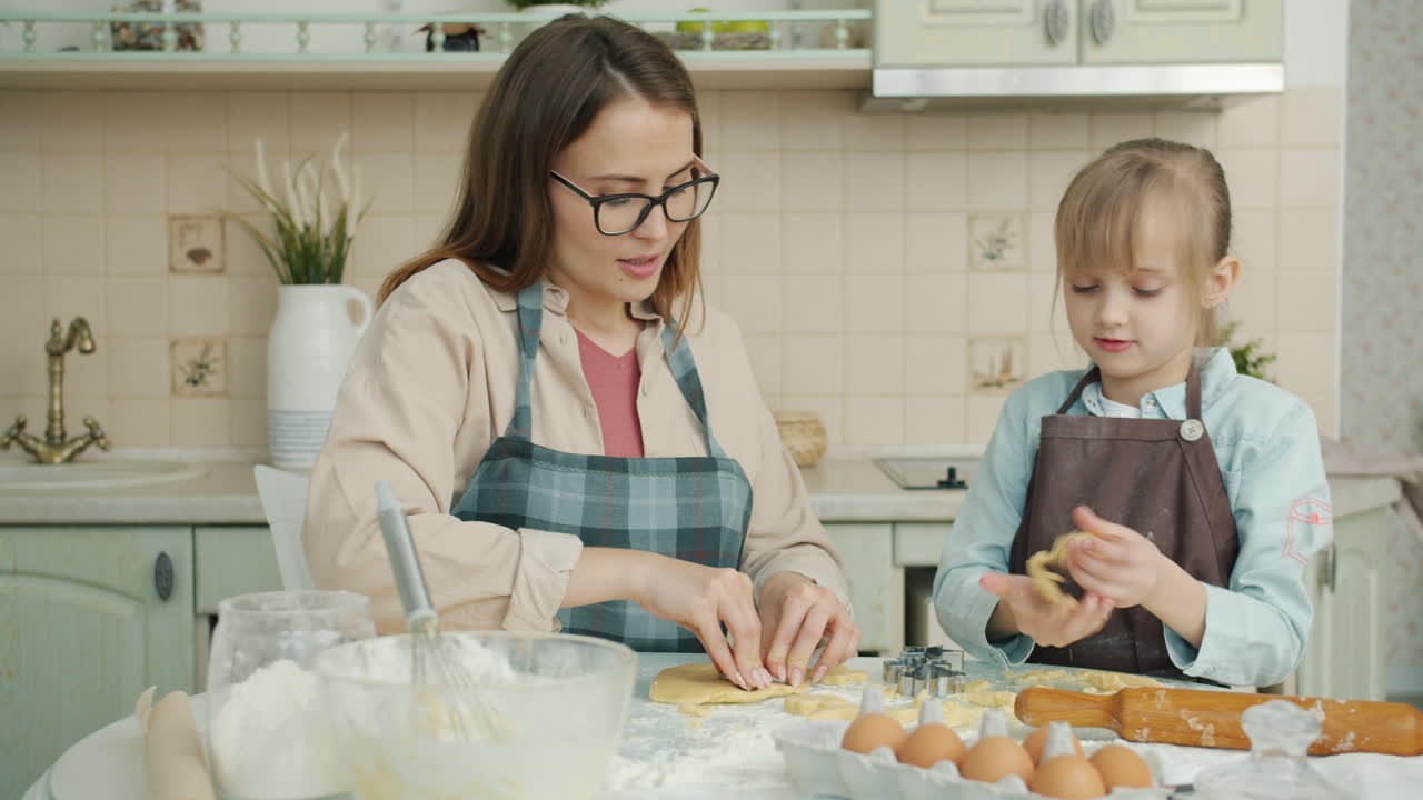Mother and Daughter Baking Cookies Together