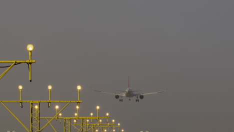 airplane landing in foggy conditions